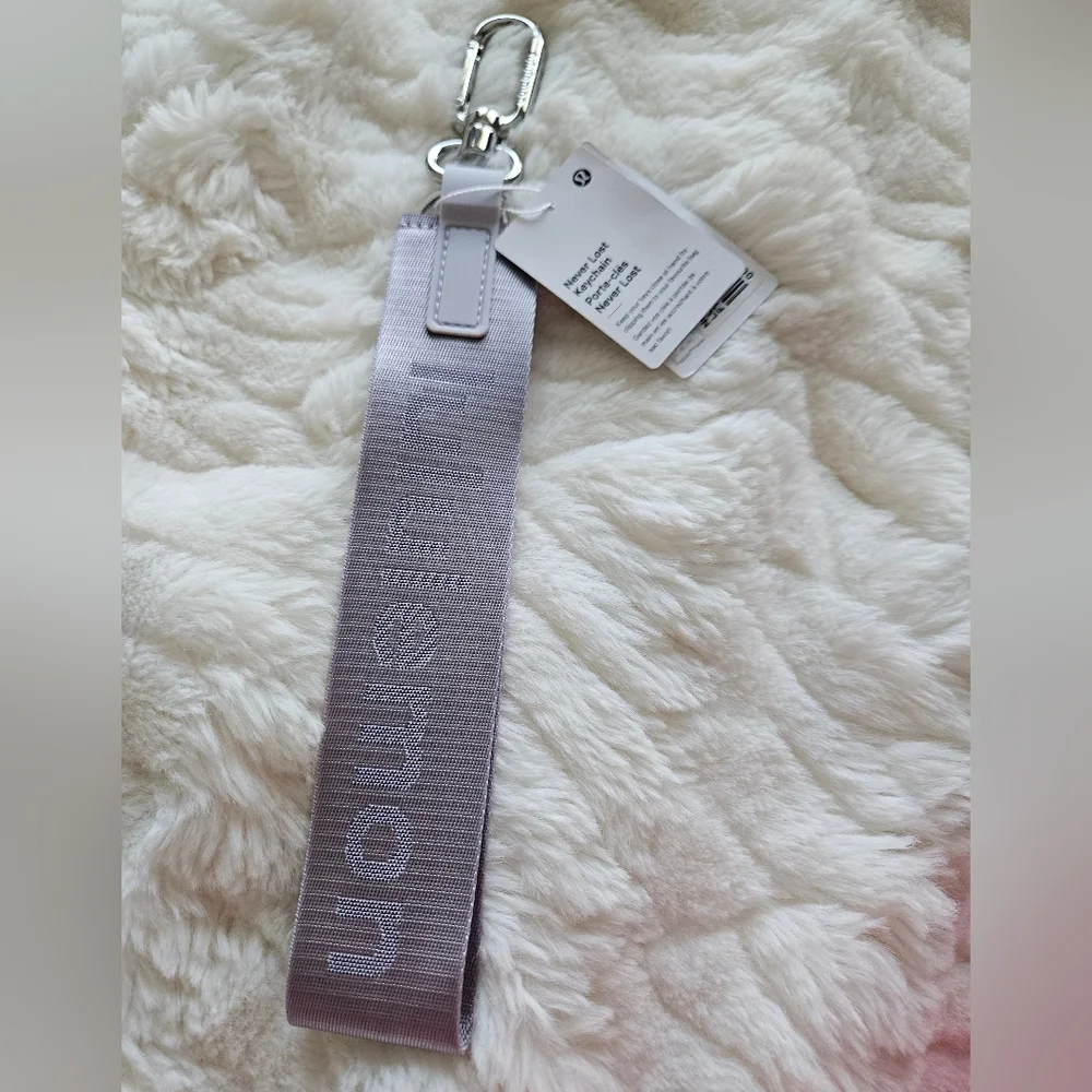 NWT Never Lost Keychain Faint Lavender/Grape Mist